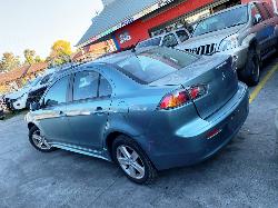 View Auto part Overflow Bottle Mitsubishi Lancer 2009