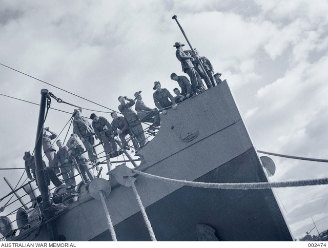AUSTRALIAN REINFORCEMENTS FOR THE AIF, LINE THE BOW RAILS OF THEIR ...