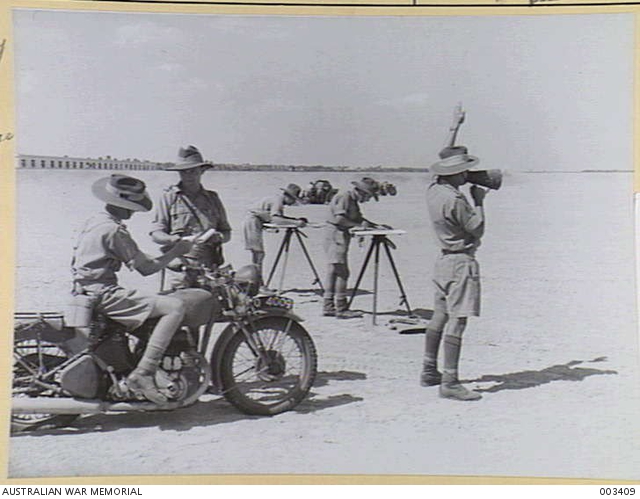 A DESPATCH RIDER HANDS A MESSAGE TO THE GUNNERY OFFICER. (NEGATIVE BY ...