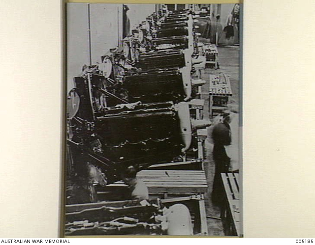 LONDON - A ROW OF ROLLS ROYCE MERLIN ENGINES AT AN AIRCRAFT FACTORY ...