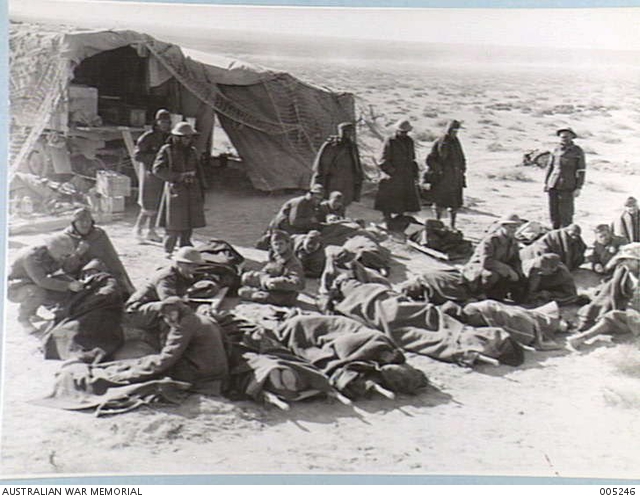 NEAR BARDIA - A GROUP OF ITALIAN PRISONERS WAITING FOR TREATMENT AT A ...