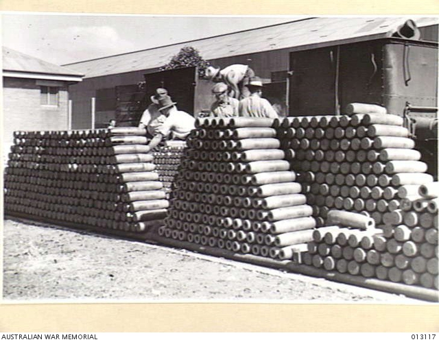 LOADING 25-POUNDER HIGH EXPLOSIVES SHELL CASES MADE AT THE SHELL ANNEXE ...