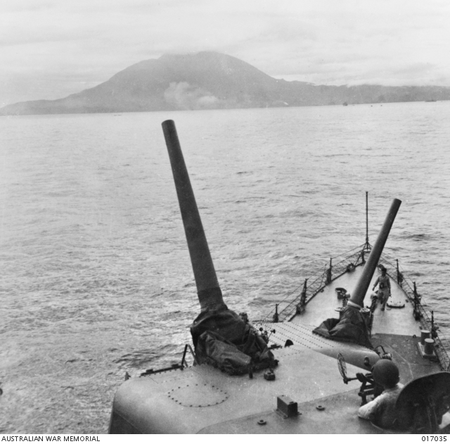 Dutch New Guinea. Smoke from air bombardment rises from approach to
