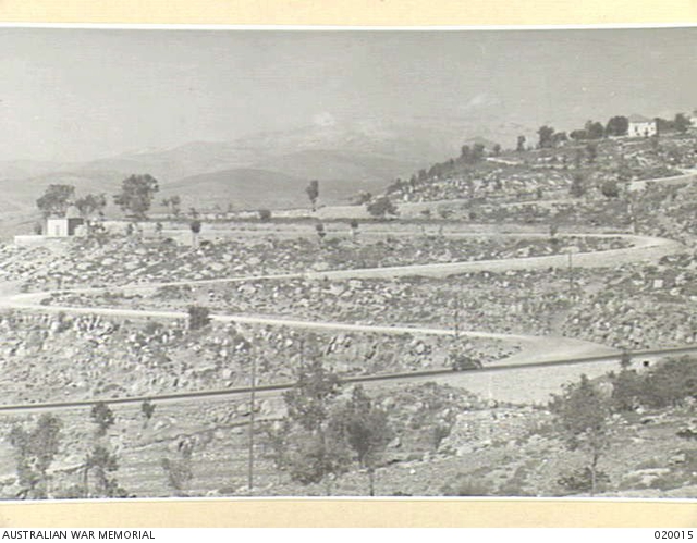 A view of the general landscape and long winding road taken from the ...