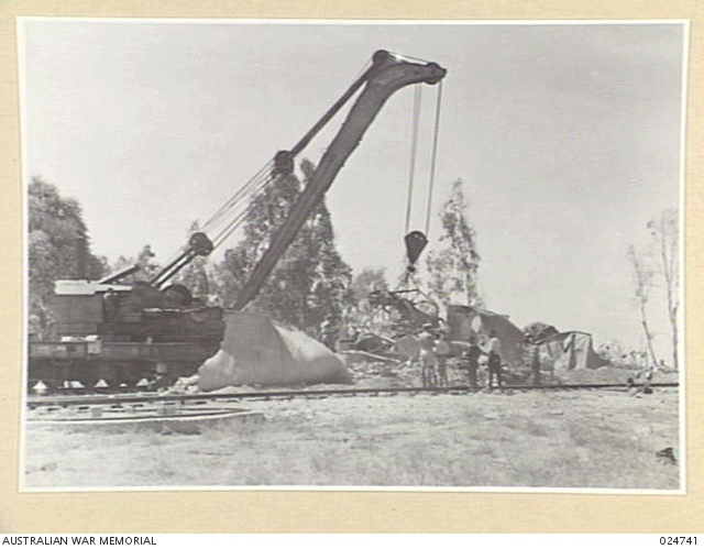 Early in August 1942, two rail trucks became detached from an ...