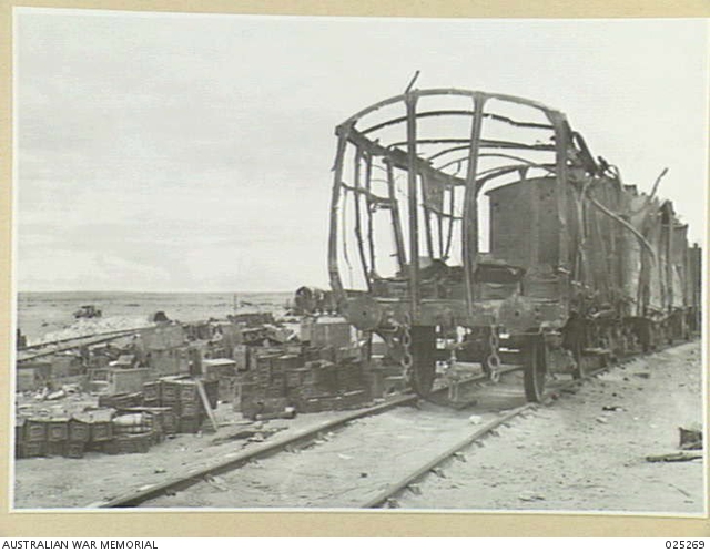 DABA, EGYPT. 1942-11-13. WRECKED AMMUNITION TRAIN AT DABA STATION ...