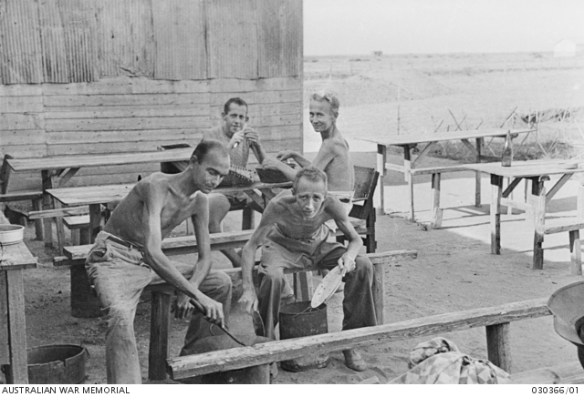 Bakli Bay, Hainan Island. c. 28 August 1945. Four Dutch officer ...