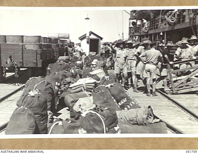 ONSLOW, WA. 1943-05-07. PERSONNEL OF THE RAAF EMBARKING FOR FREMANTLE ...