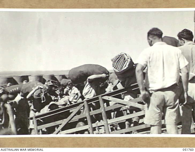 ONSLOW, WA. 1943-05-07. PERSONNEL OF THE RAAF EMBARKING FOR FREMANTLE ...