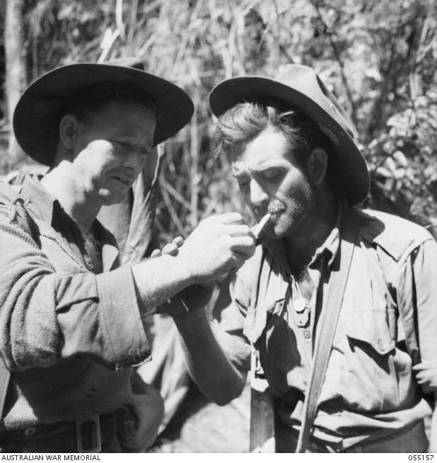 NEW GUINEA, 1943-07-27. VX90605 PRIVATE H. CARTWRIGHT (LEFT) AND VX3334 ...