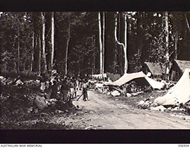 REINHOLD HIGHWAY, NEW GUINEA, 1943-08-31. NATIVE ROAD WORKERS DUE FOR ...