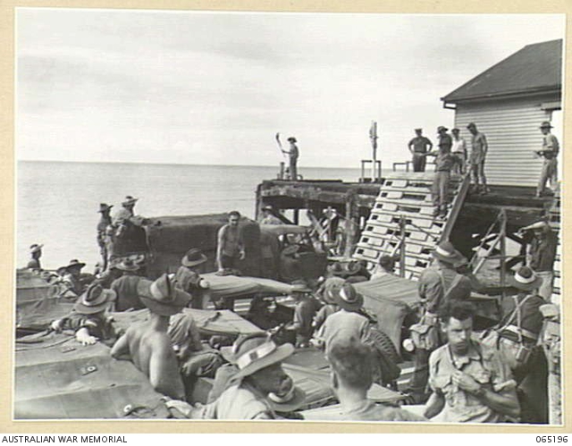 PORT DOUGLAS, NORTH QUEENSLAND, AUSTRALIA. 1944-03-17. A SIGNALLER ON ...