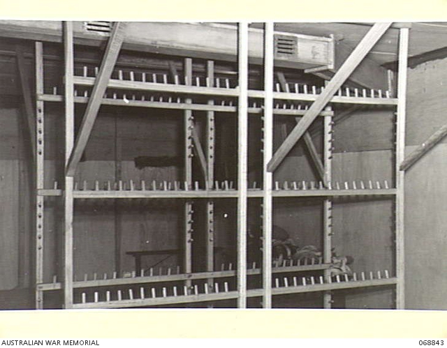 MAREEBA, NORTH QUEENSLAND, AUSTRALIA. 1944-08-10. PARACHUTES RACKS IN ...