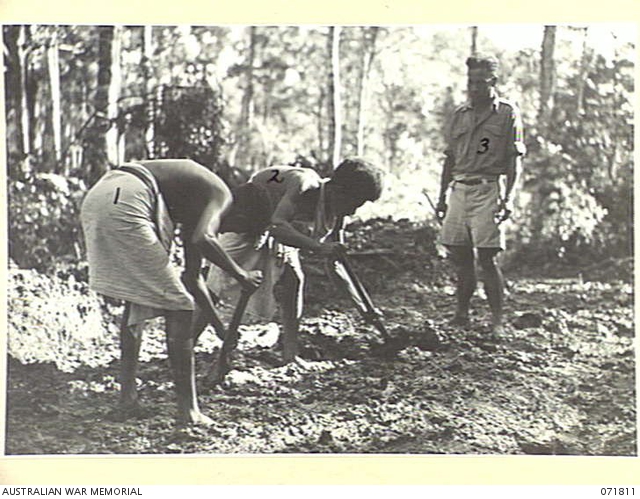 ILOLO, NEW GUINEA, 1944-03-30. MEMBERS OF THE NATIVE LABOUR CAMP ...