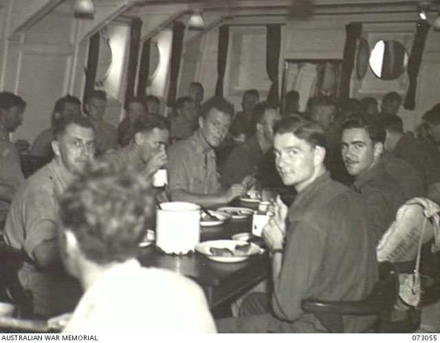 AT SEA, 1944-05-12. OTHER RANKS AT MESS ABOARD THE TROOPSHIP ORMISTON ...