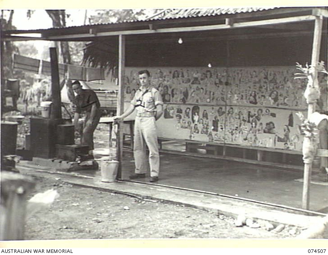 LAE, NEW GUINEA. 1944-07-05. CORPORAL G. RYAN (1) AND PRIVATE S ...
