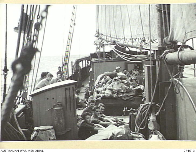AT SEA. 1944-07-12. AUSTRALIAN TROOPS RELAXING ON THE DECK OF THE AK 95 ...