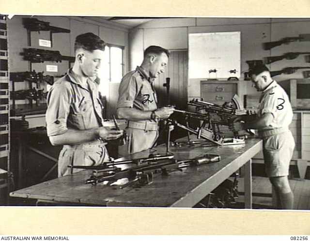 INGLEBURN, NSW. 1944-10-31. ARMOURER INSTRUCTORS CHECKING PRACTICAL ...