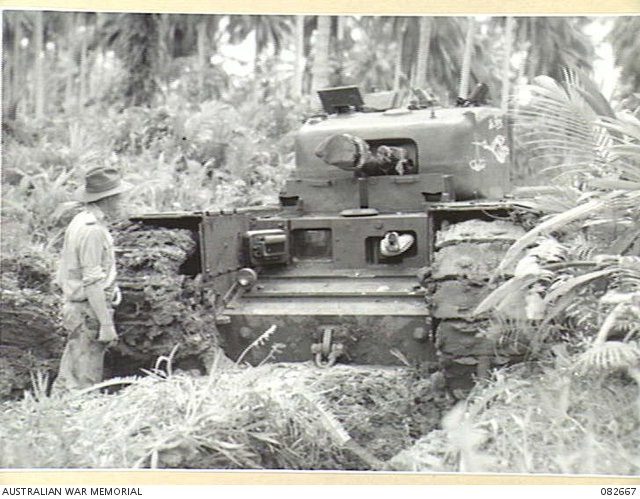 MILILAT, NEW GUINEA. 1944-10-12. 'THE STORK', A CHURCHILL V TANK BOGGED ...
