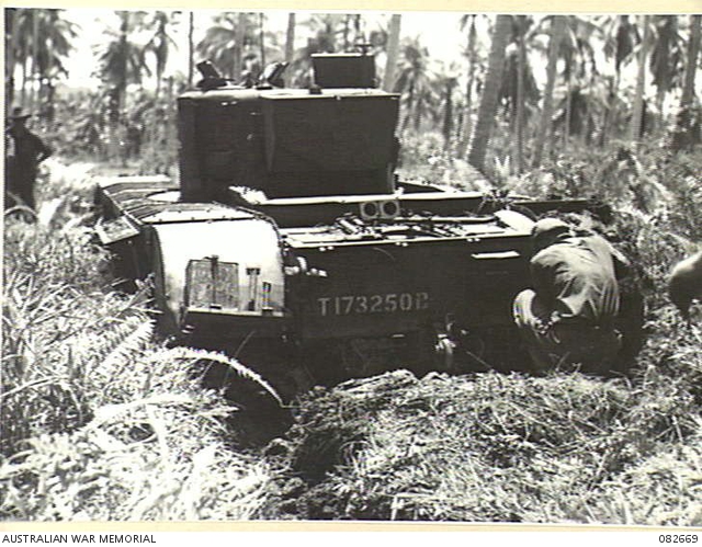 MADANG, NEW GUINEA. 1944-10-12. THE REAR VIEW OF A BOGGED CHURCHILL V ...