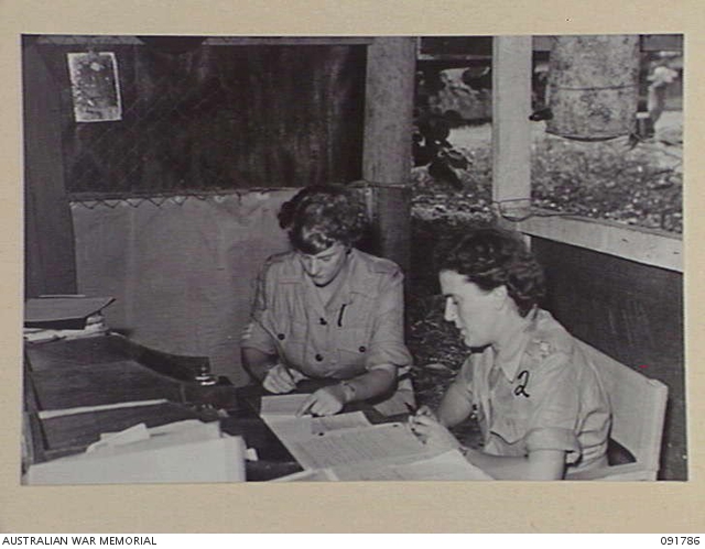 LAE NEW GUINEA 1945 05 15 SERGEANT W HODGETTS 1 TAKES DICTATION 