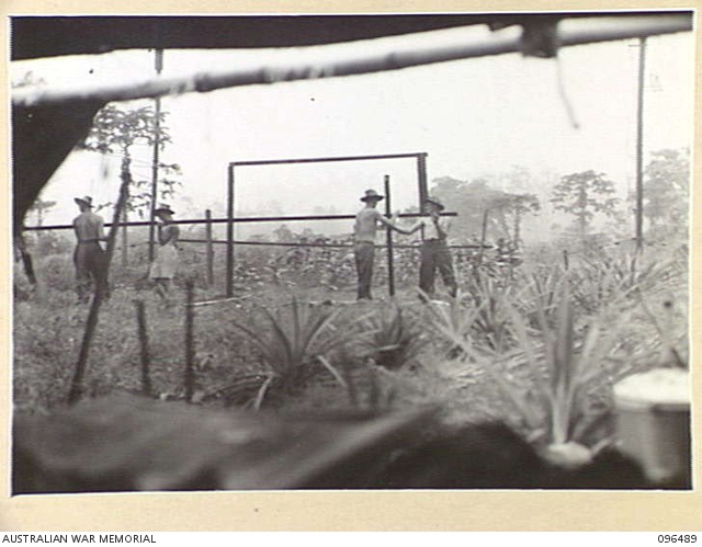 RABAUL, NEW BRITAIN, 1945-09-12. MEMBERS OF 4 INFANTRY BRIGADE WORK IN ...