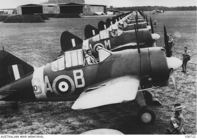 MALAYA. AIRCRAFT OF A RAAF SQUADRON LINED UP ON AN AIRFIELD ...