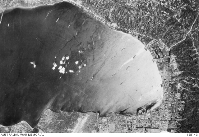 RABAUL, NEW BRITAIN, 1942-08-12. A CONCENTRATION OF BOMBS FROM RAAF ...