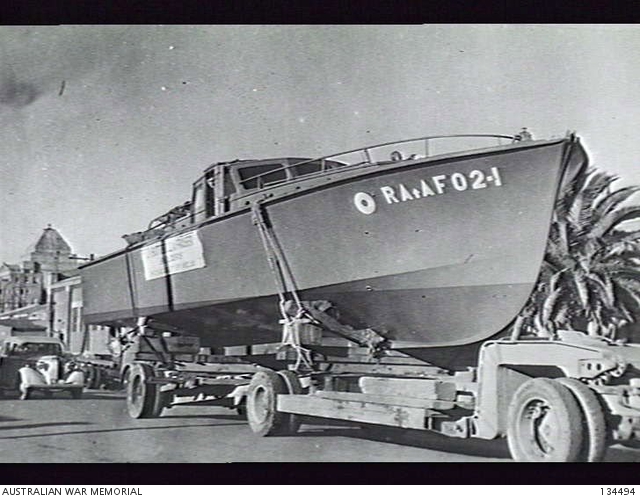 C.1942. RESCUE LAUNCH 02-1, BEING TRANSPORTED FROM CONTRACTORS YARD IN ...