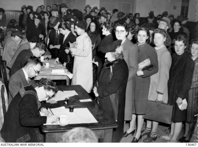 MELBOURNE, VICTORIA, 1942-06-15. A BUSY SCENE AT THE RATION BOOK ...