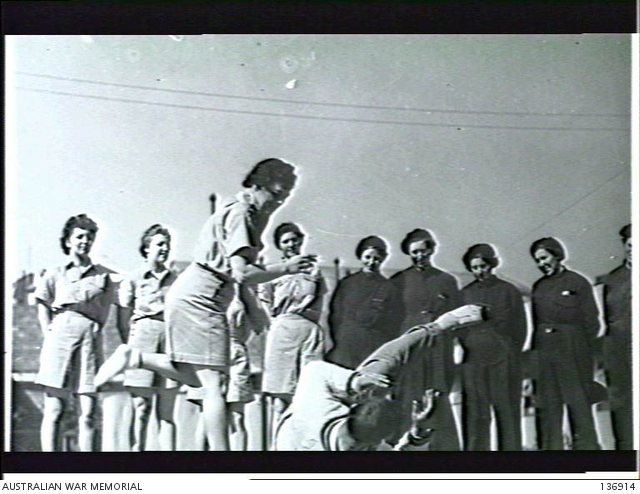VICTORIA. 1942-09-29. 354102 SECTION OFFICER J. B. CARTER DISARMS ...