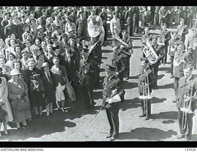 MELBOURNE, VIC. 1942-12-19. THE RAAF BAND MARCHING INTO POSITION DURING ...