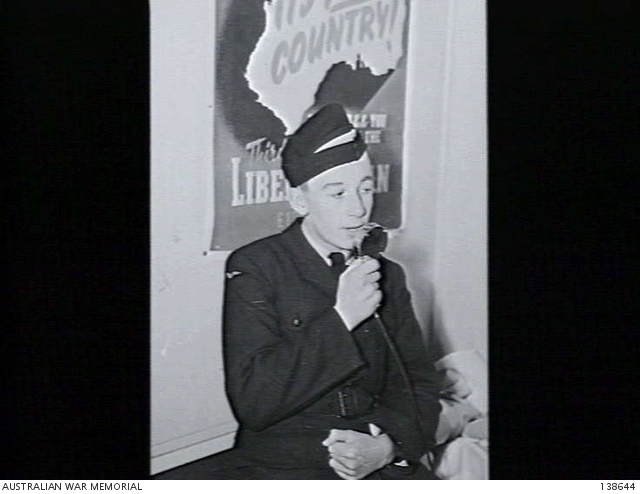 Melbourne, Vic. 1943-04-16. A RAAF air crew trainee speaking over the ...