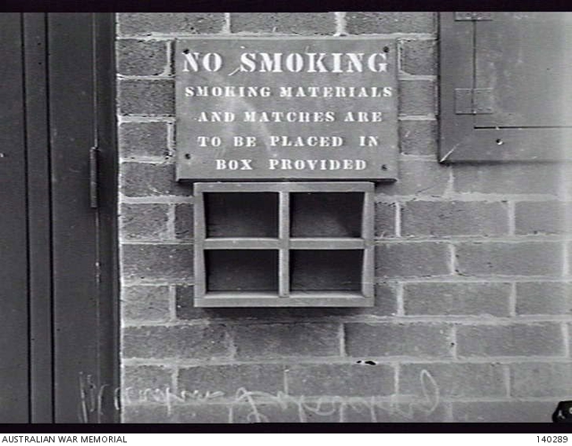 MELBOURNE, VIC. 1944-01-13. A SELF EXPLANATORY SIGN AND BOX OUTSIDE A ...