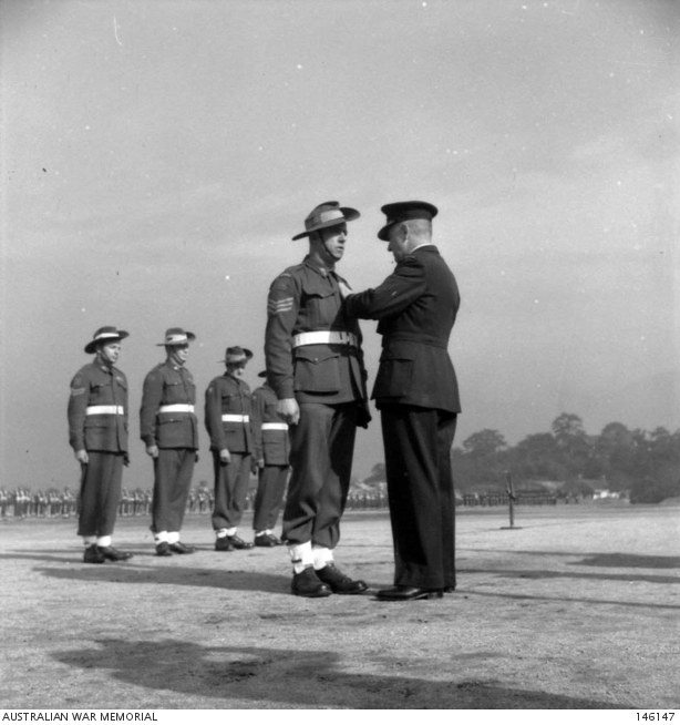 Kure, Japan. 1949-01-26. Air Vice Marshal J. P. McCauley RAF, Chief-of ...