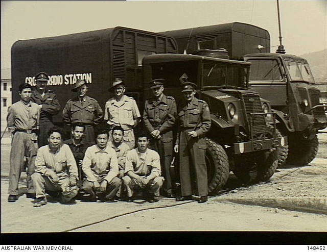 Kure, Japan. 1953-05-11. Standing beside the Crown Radio Station Van ...