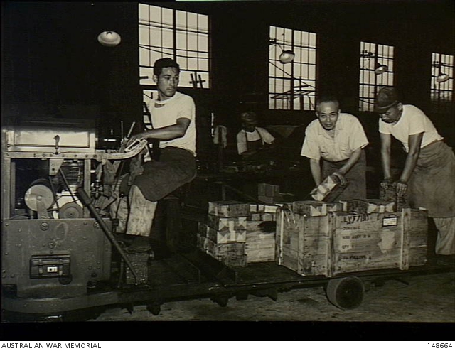 Kure, Japan. 1953-09. Japanese civilian employees delivering spare ...