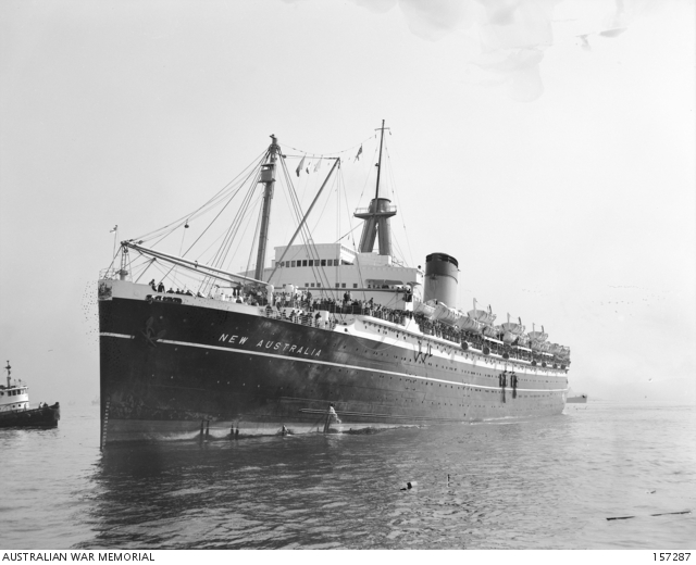 Darwin, NT. 15 March 1943. A blazing oil tank at a naval installation