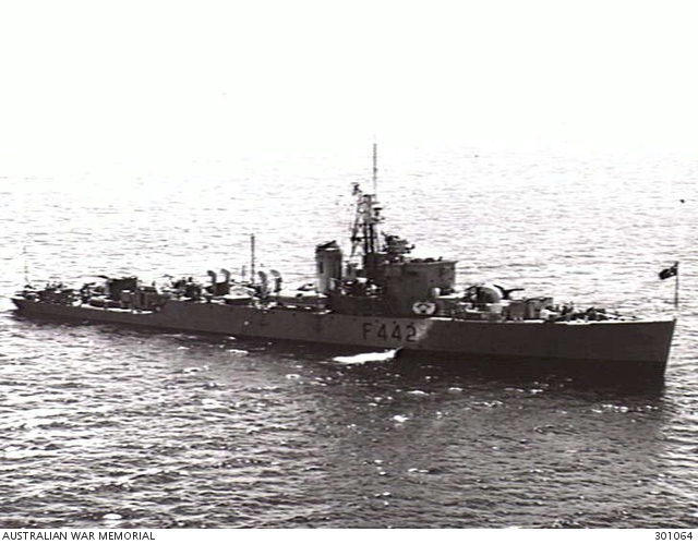JERVIS BAY, NSW. 1954-10. AERIAL STARBOARD SIDE VIEW OF THE FRIGATE ...