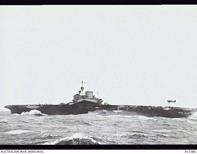 C.1943. PORT SIDE VIEW OF THE AIRCRAFT CARRIER HMS FORMIDABLE WITH A ...