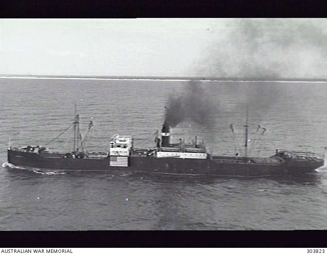 1941-09-10. AERIAL PORT SIDE VIEW OF THE AMERICAN CARGO VESSEL QUAKER ...