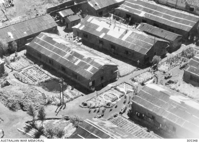 YOKOHAMA, JAPAN. 1945-08. AERIAL VIEW OF A PRISONER OF WAR CAMP WHERE ...
