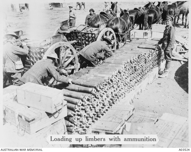 Royal Field Artillerymen loading up limbers from an 18 pounder ...