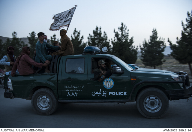 Taliban fighters, mostly from Paktika province, in vehicles seized from ...