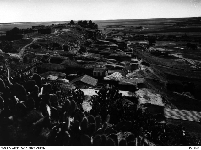 A view overlooking the roofs of a village on a hill near Gaza. Note the ...