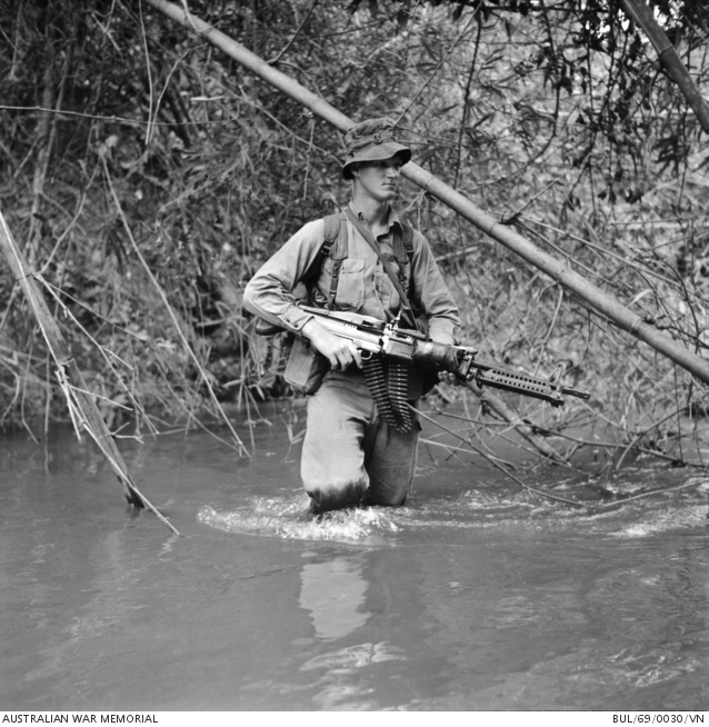 South Vietnam. 1969-01-22. Machine gun loaded, Private Don Seward of ...