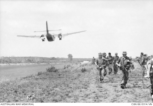 Vietnam. 1966-04-16. Australian troops move from the airstrip at Song ...