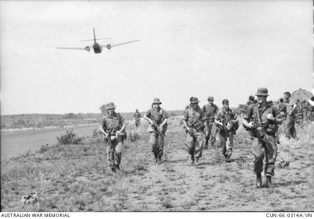 Vietnam. 1966-04-16. Australian troops move from the airstrip at Song ...