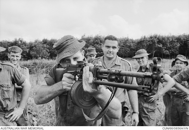 Phuoc Tuy Province, Vietnam. 1966-10. Firing a captured ...