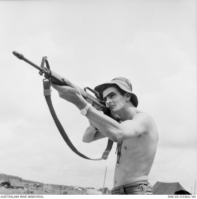 Bien Hoa, Vietnam. 196509. Getting a line on the Armalite rifle is